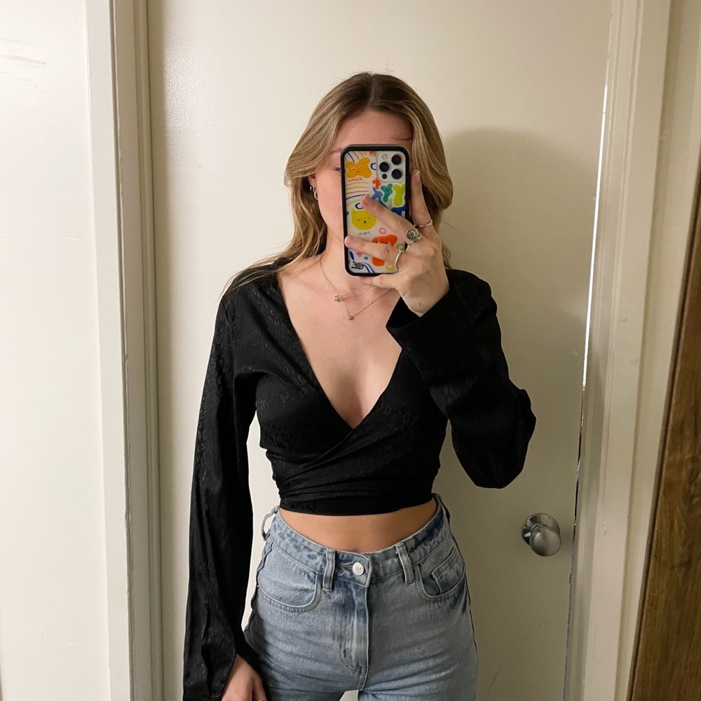 Black cheetah print wrap top